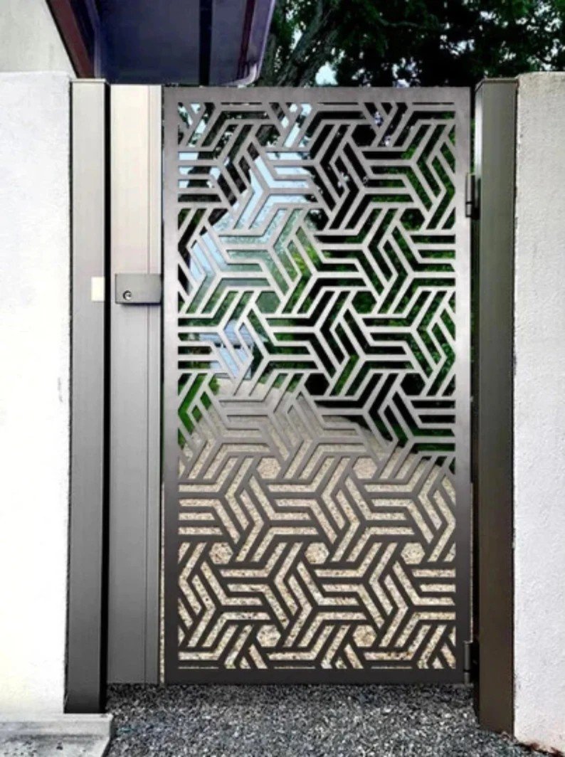 Modern laser-cut geometric steel driveway gate